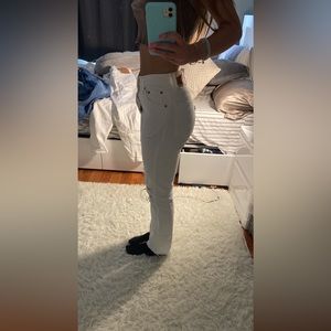 Levi’s 501 jean, in white. size small with rips